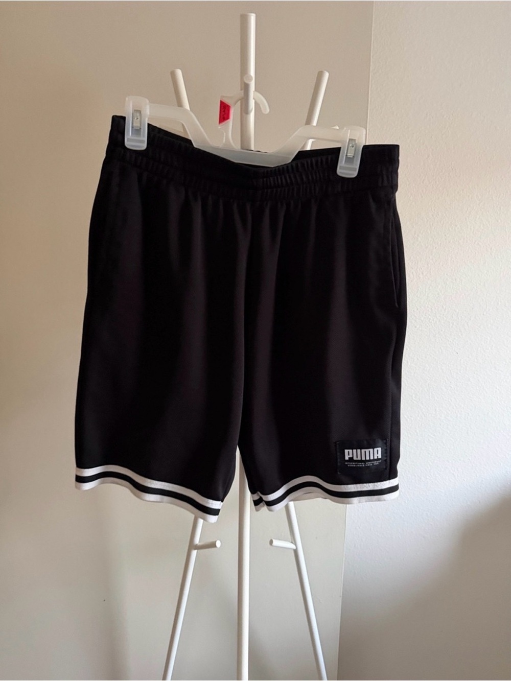 Puma Black Athletic Shorts with White Stripe Hem